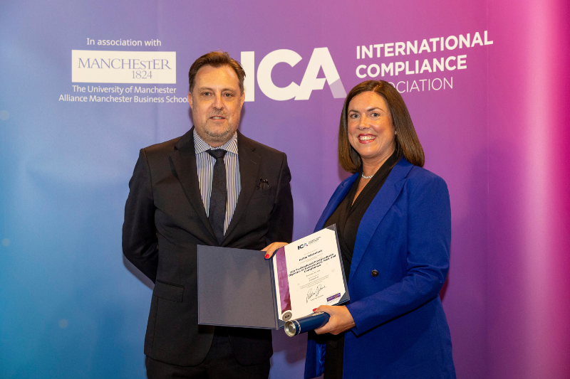 ICA President Pekka Dare presents graduate with her certificate