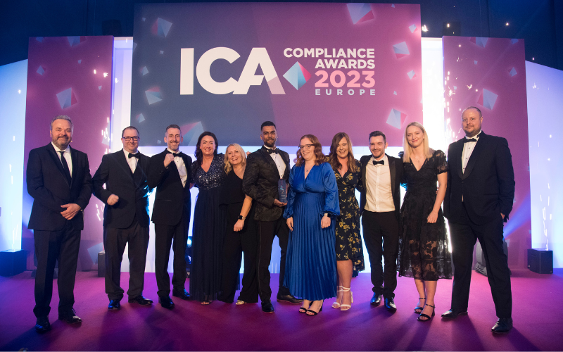 A team of compliance professionals on stage at the ICA Compliance Awards 2023