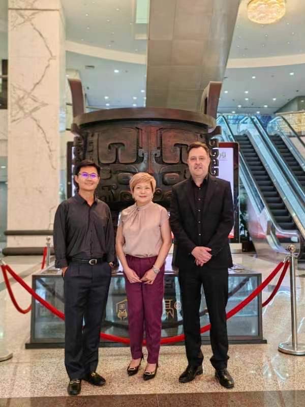 Dr Justin Xu, Ms Lim May May and Mr Pekka Dare